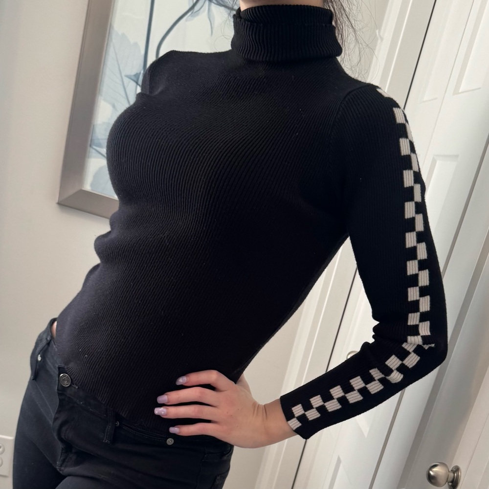 Black Turtleneck Sweater with Checkered Sleeves